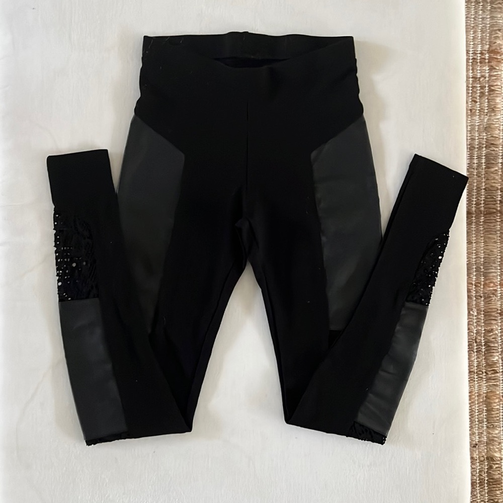 Black lace and faux leather leggings